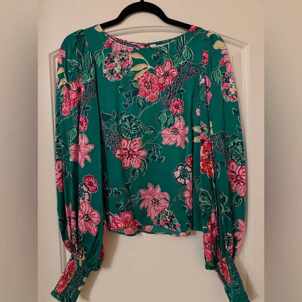 Lilly Pulitzer Alfreda Blouse in Green with Pink in the pattern safari sanctuary